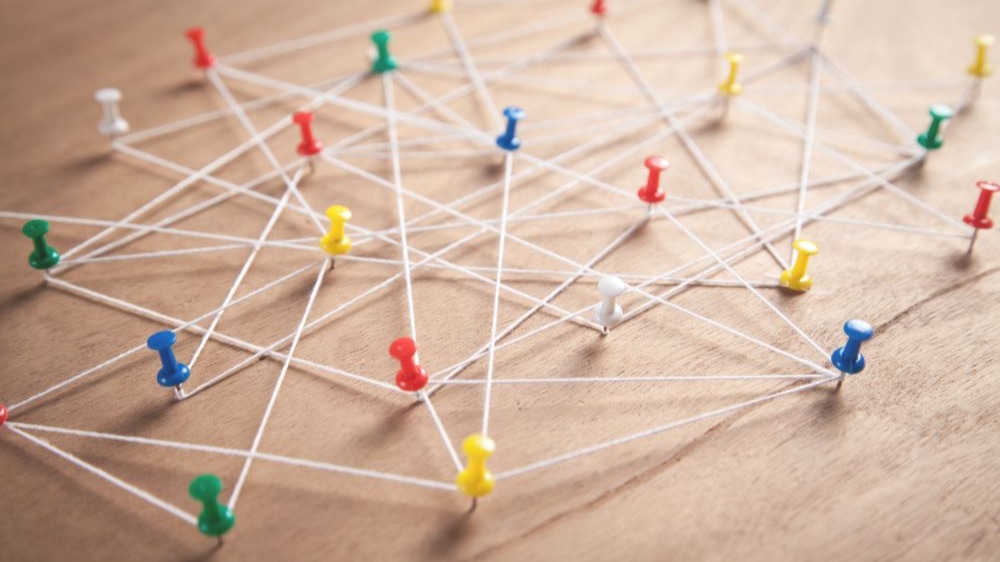 Push pins connected with thread. Network