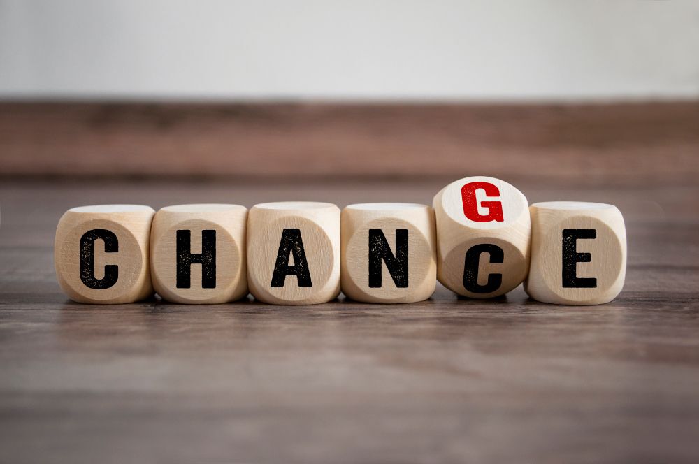 dice spelling out the word change